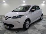 a picture of a white car parked in a showroom