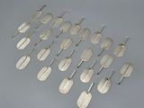 a set of eight silver plated spoons and spatulas