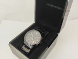 a watch that is in a box on a table
