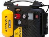 a black and yellow air compressor on a white background