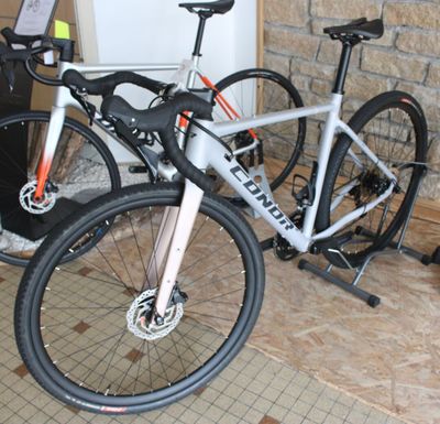 two bikes parked next to each other on the floor