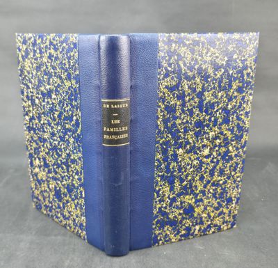a blue and gold book with a gold foiled cover