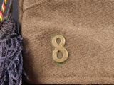 a brown bag with a number 8 on it