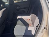 a car that has a seat in the back of it