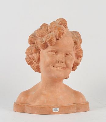 an image of a statue of a child ' s head on a white surface