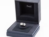 an image of a ring in a black box on a white background