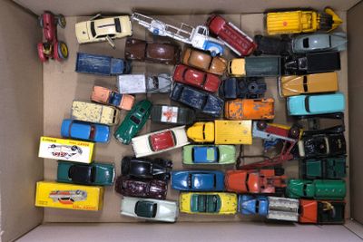 a box full of toy cars and trucks in it