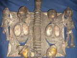 a metal object that is on a blue cloth