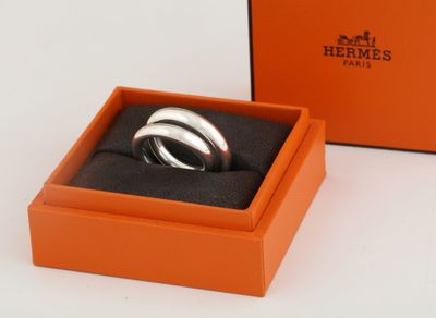 an image of a couple of rings in a box on a table