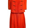an orange dress and jacket on a mannequin mannequin mannequin mannequin mannequin mannequin mannequin mannequin mann