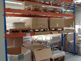 many boxes and boxes on the shelves in the warehouse