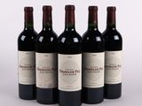 six bottles of red wine are lined up in a row