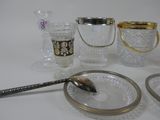 a lot of glass items that are on the table