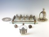 a lot of silver items that are on the table