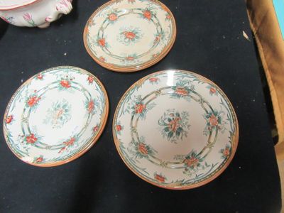 three plates that are sitting on top of a table