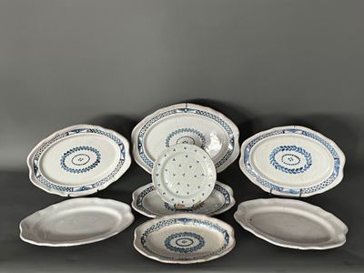 six pieces of blue and white porcelain dishes and plates on a table