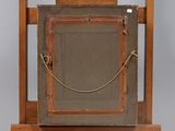 a picture of an old wooden frame with a rope on it