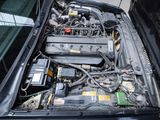 a car engine that is sitting in the trunk of a car