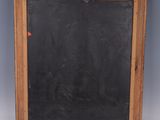 an old wooden framed chalkboard with a blackboard in the middle