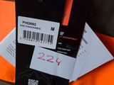 a luggage tag that is attached to an orange bag