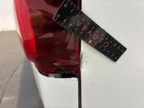 a sticker on the back of a car that says vaiuo