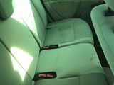 the back seats of a car are clean and ready to be used