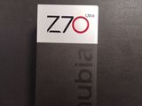 a close up of a business card sitting on top of a desk