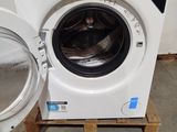 a washing machine that is sitting on a pallet