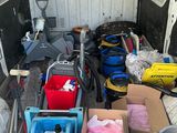a truck with many items in the back of it