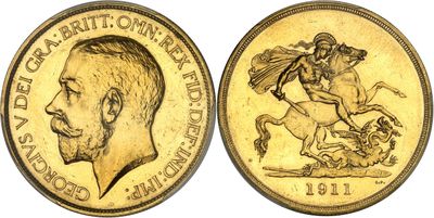 a close up of a gold coin with a man on a horse