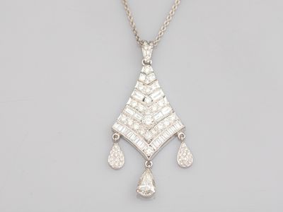 a white gold and diamond pendant