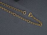 gold plated necklace with a chain that has the word love written on it