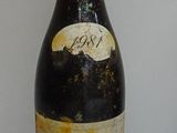 a bottle of wine that is sitting on a table