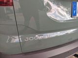 a close up of a car with a sticker on the back of it