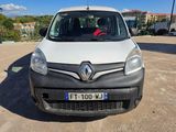 a white van that is parked in a parking lot