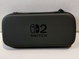 a close up of a nintendo switch case sitting on a table