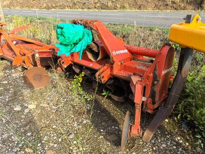 a tractor that has been pulled over by a plow