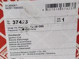 a box of pizza sitting on a table with a price tag