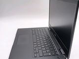 a black laptop with a black keyboard on a white surface