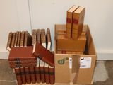 a lot of books that are sitting in a box