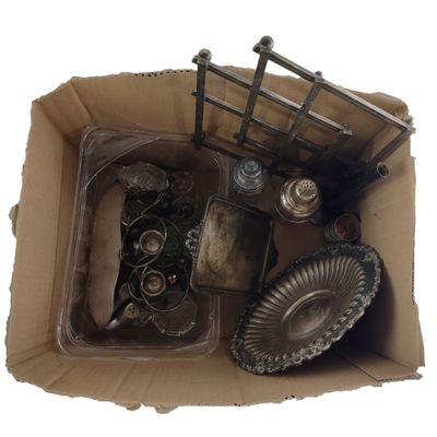 a cardboard box with a bunch of items in it