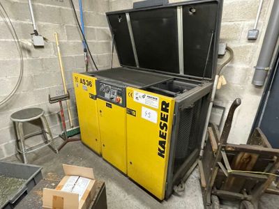 a machine that is sitting next to a box
