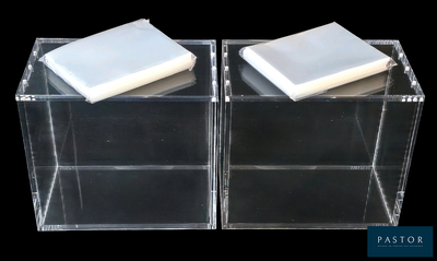 two soap bars in a clear box on a black background