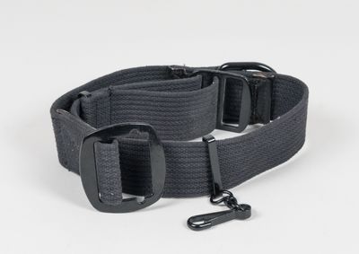 a close up of a black belt on a white background