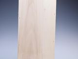 a piece of plywood plywood wood with a black background