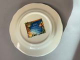 a white plate with a book on it sitting on a table