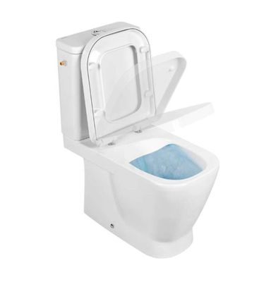 un gros plan d'une cuvette de WC avec le couvercle ouvert