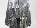 a silver sequinized jacket on a mannequin mannequin mannequin mannequin mannequin mannequin mannequin mannequin