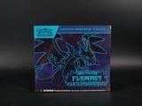 un gros plan sur une boîte de cartes à collectionner Pokémon posée sur une table