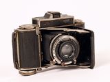 an old camera that is sitting on top of a table